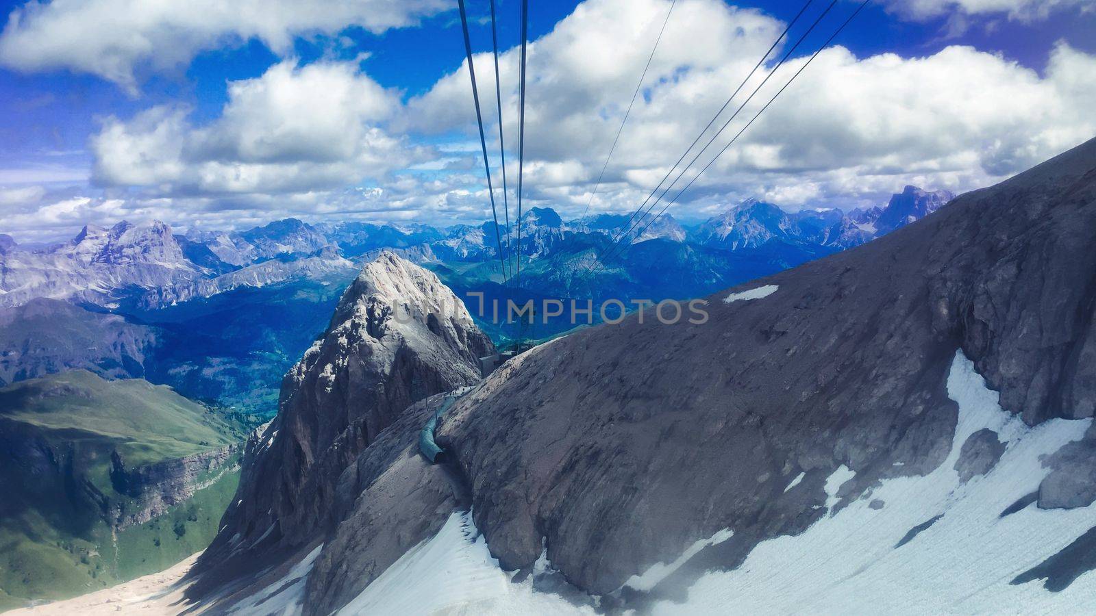 Slow motion of Marmolada Cable Car view in summer season, italian alps.