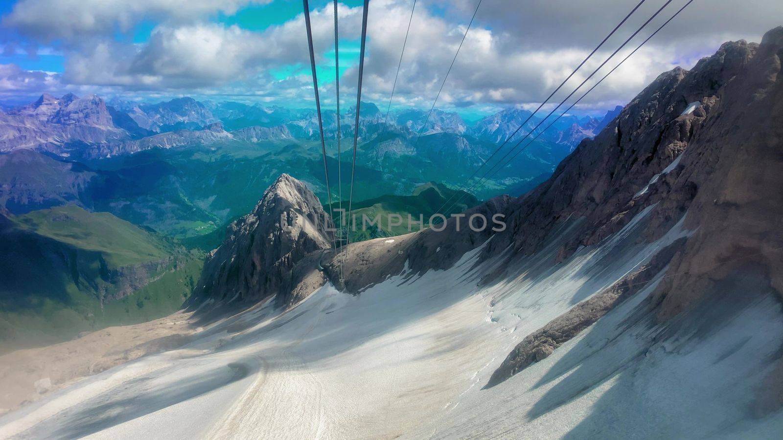 Slow motion of Marmolada Cable Car view in summer season, italian alps.