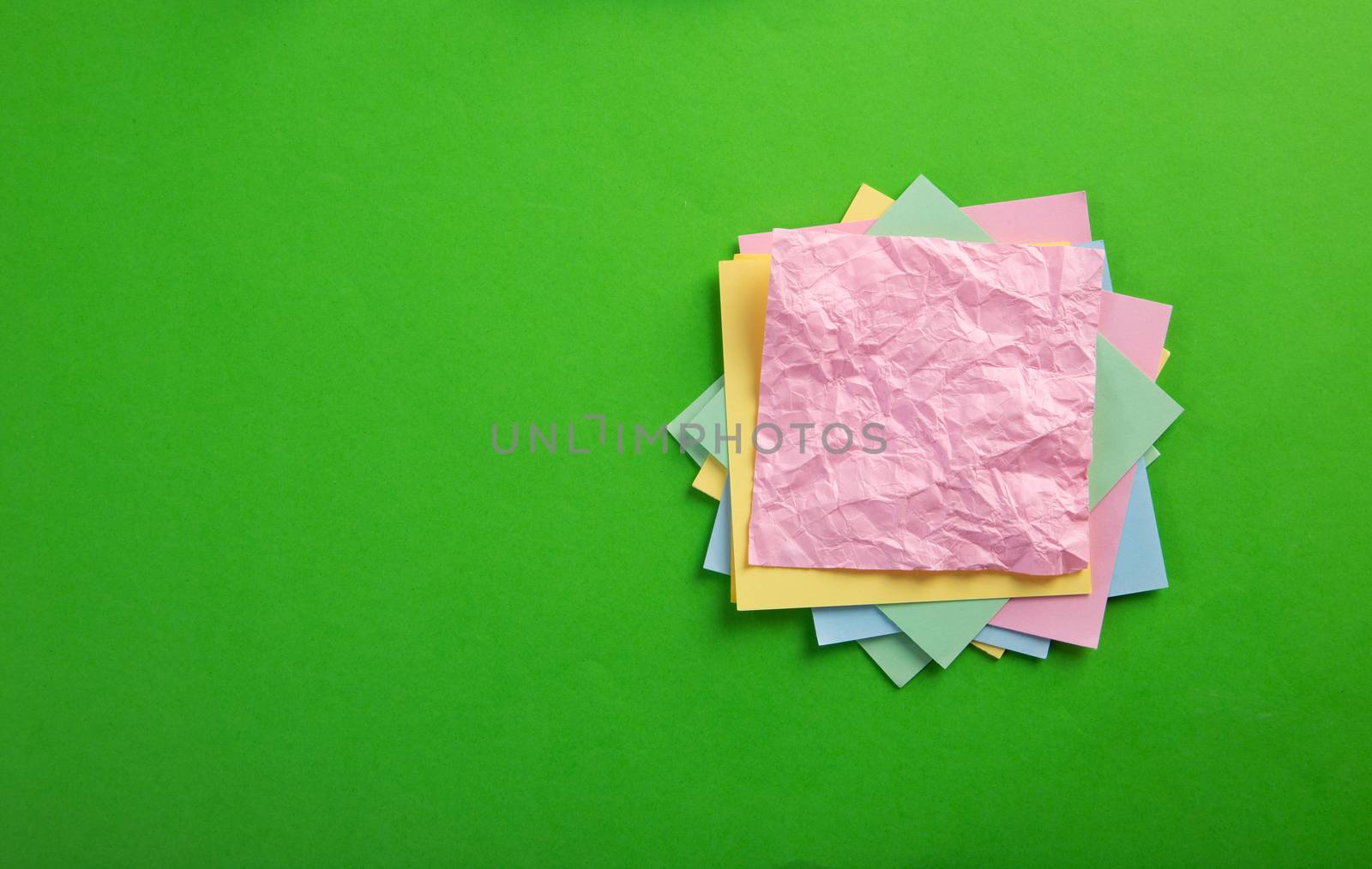 color blank notepad on color background