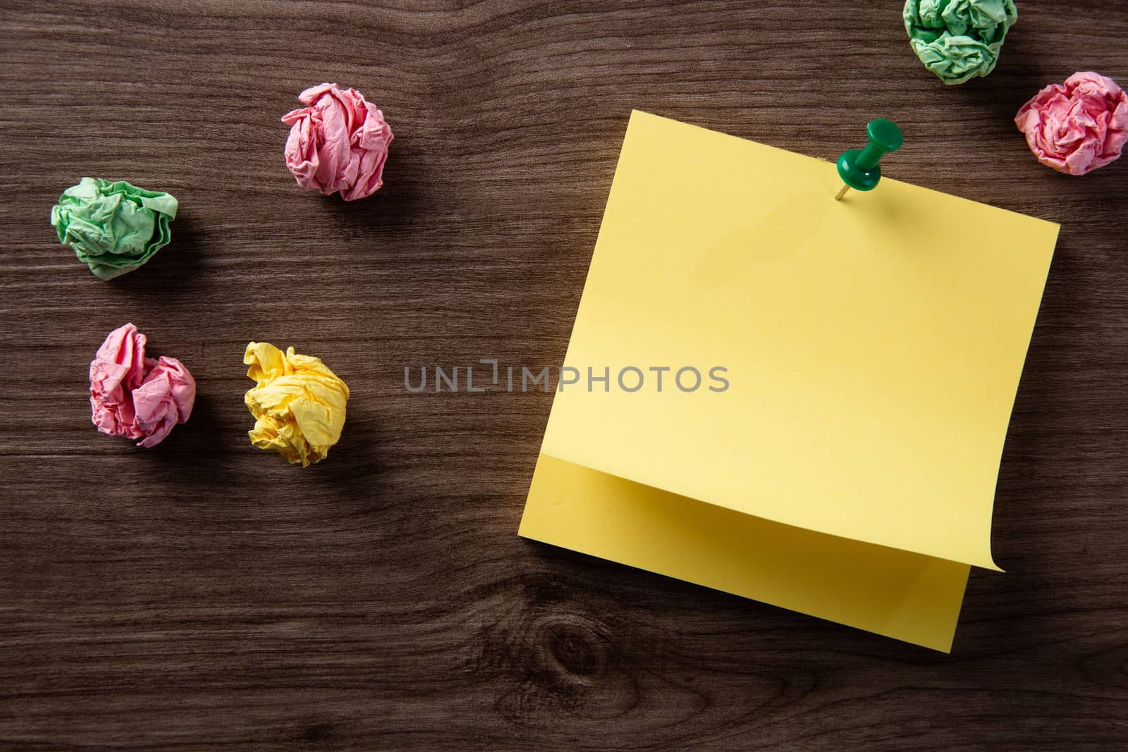 color blank notepad on wooden background
