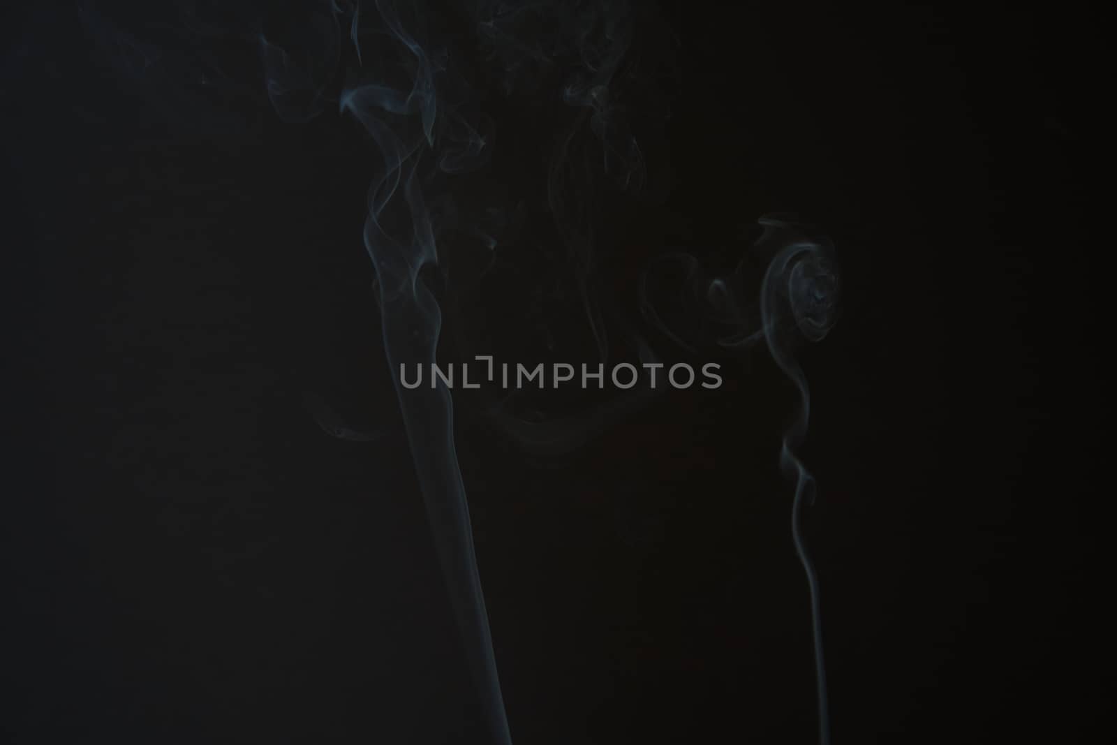 Smoke shape on black background with copy space for text