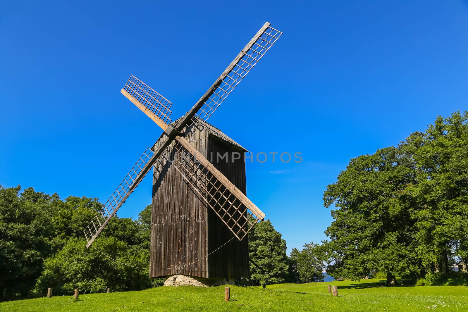 Traditional windmill in Estonia by zittto