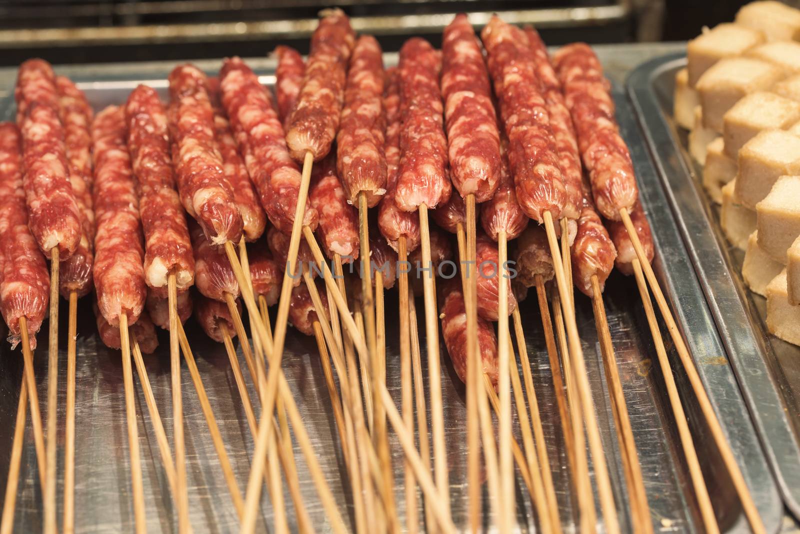 Street food asia. Meat on a stick. Chinese street food