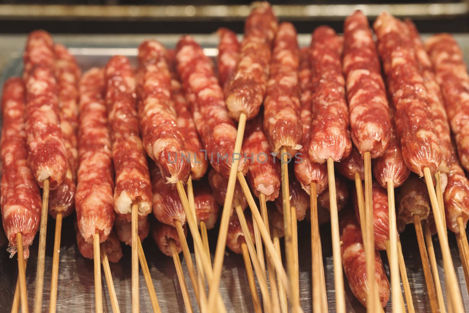 Street food asia. Meat on a stick.