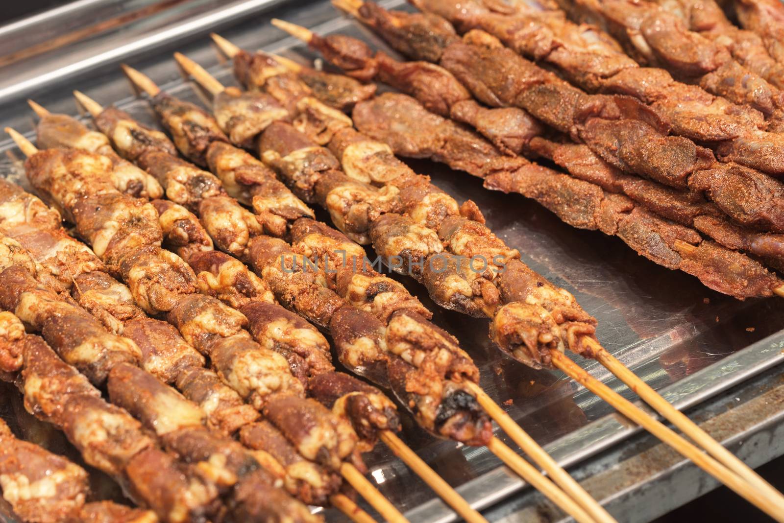 Street food asia. Meat on a stick.