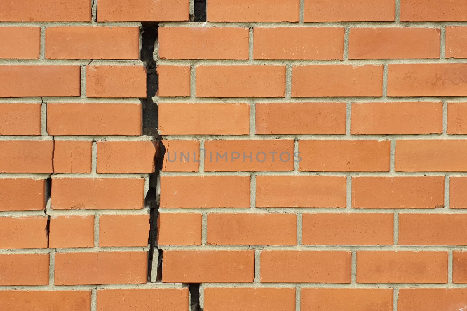 cracked brick wall by Visual-Content