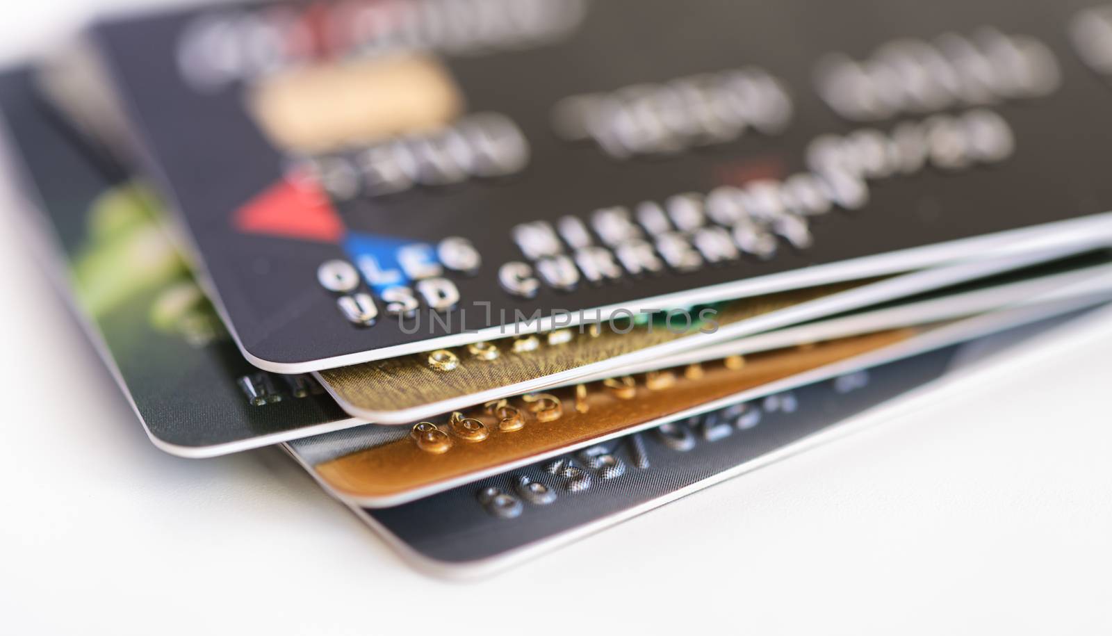 Credit card close-up. Credit card pile. Plastic card on white background