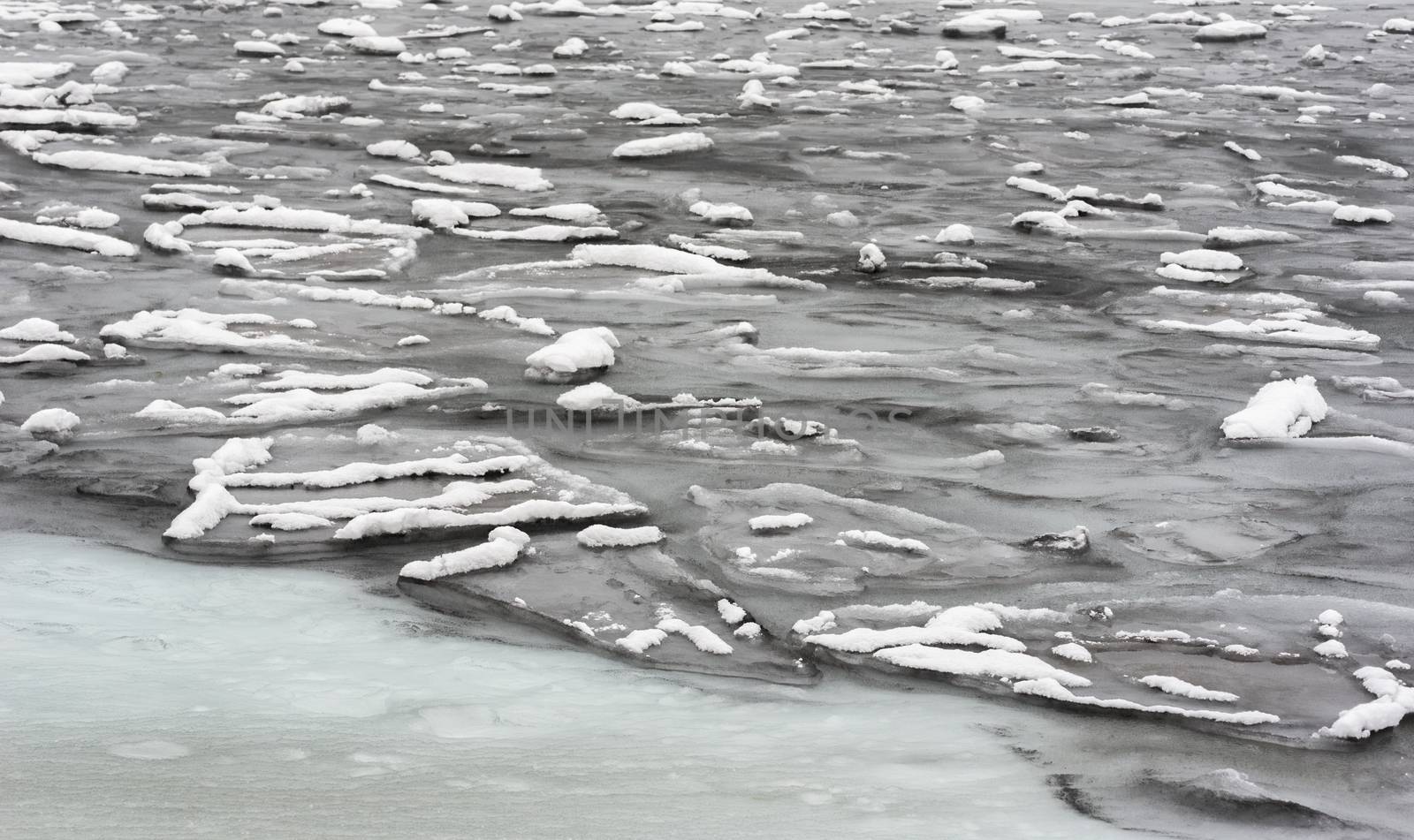 Environmental pollution. Dirty sea ice. Environment concept