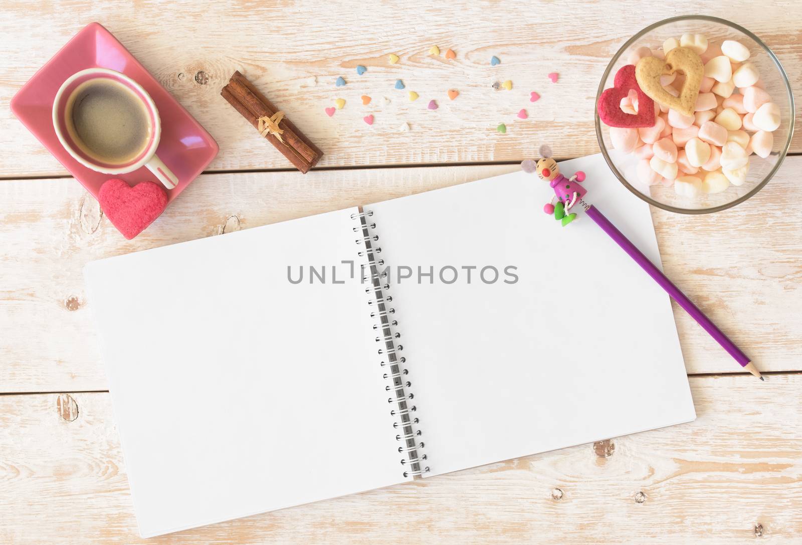 Blank paper on table. Blank sheet of paper, coffee cup, cookie, pencil on wood background. Design mockup