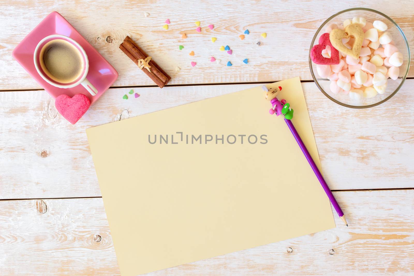 Blank paper on table. Blank sheet of paper, coffee cup, cookie, pencil on wood background. Design mockup