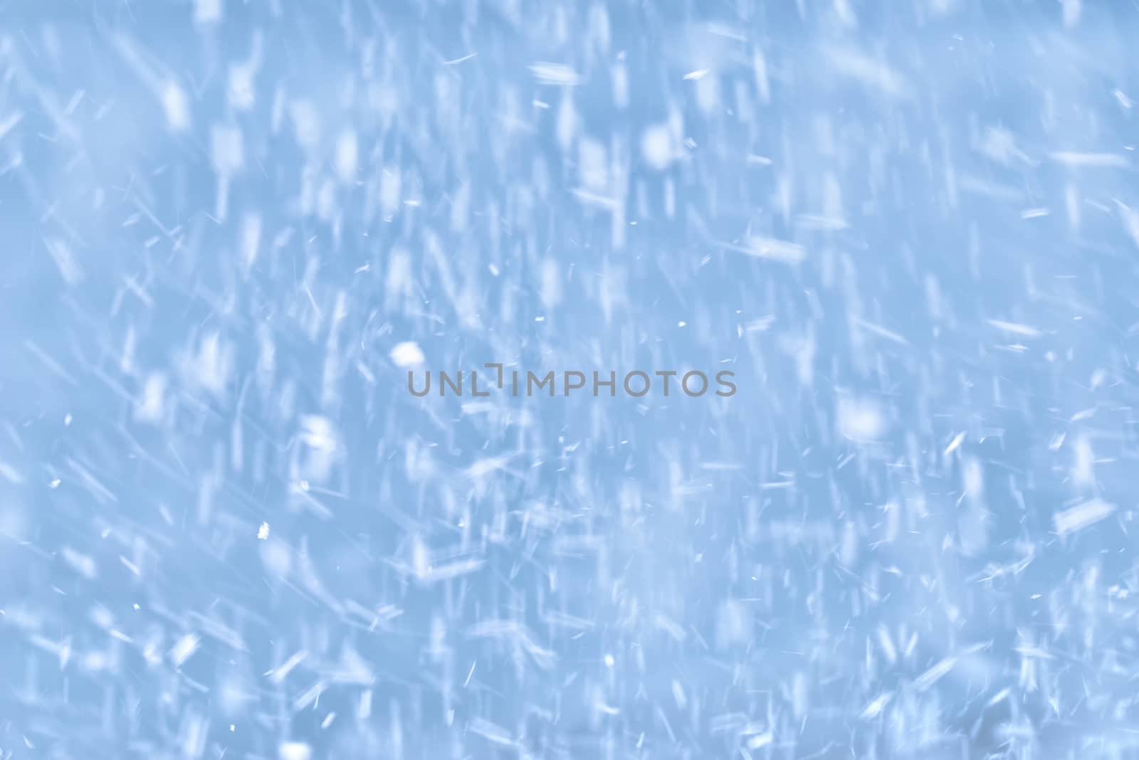 falling snow on a blue background by Visual-Content