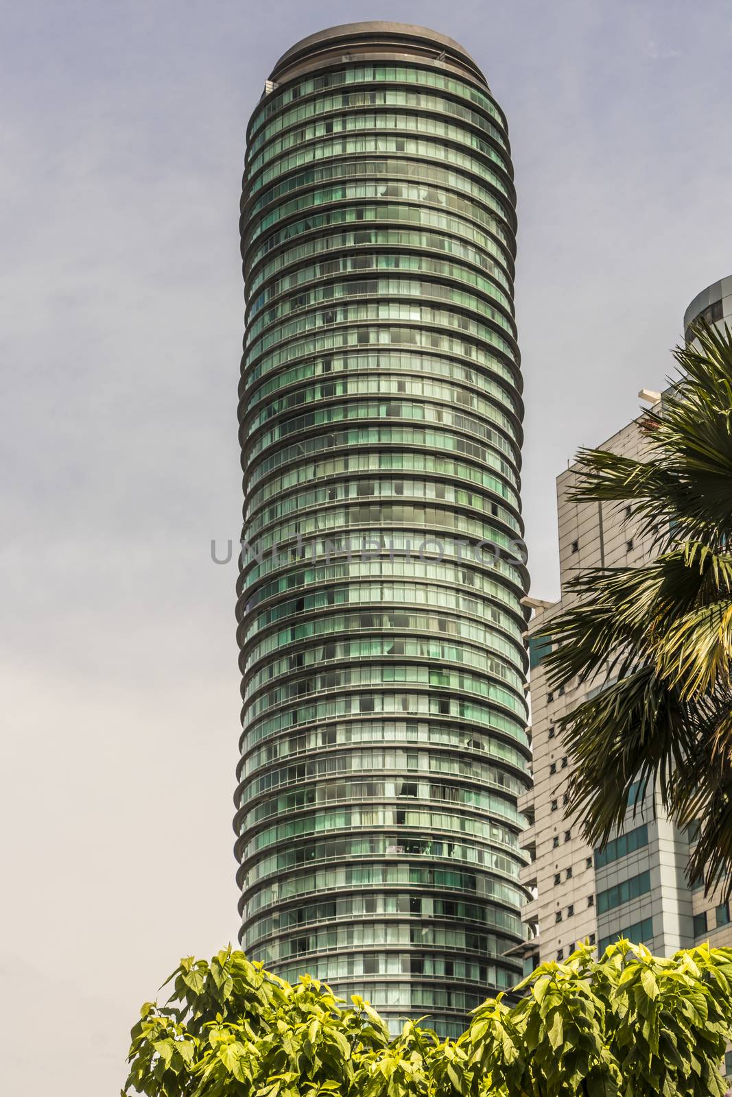 Amazing round building skyscraper in Kuala Lumpur, Malaysia. by Arkadij