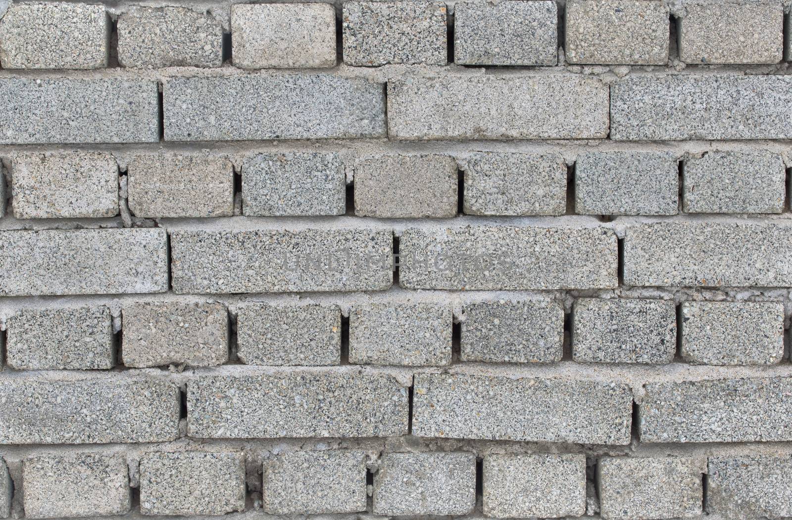 gray brick wall by Visual-Content