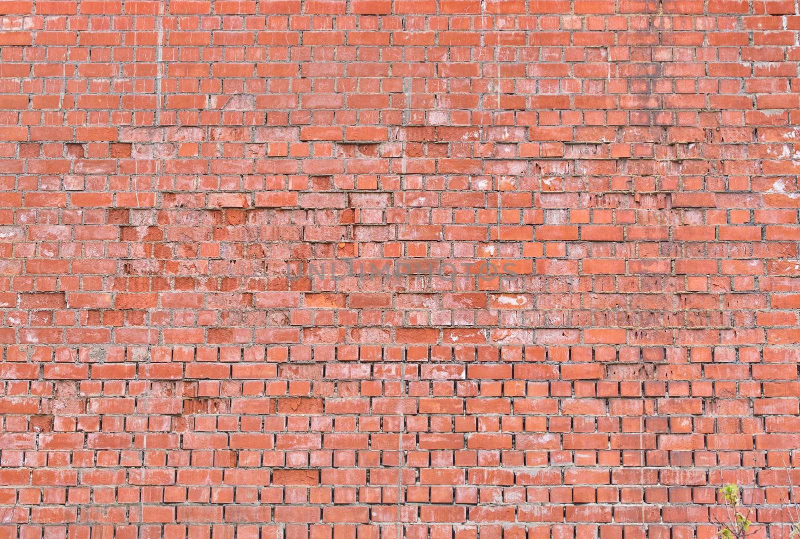 Old large red brick wall background. Rustic old brick wall texture