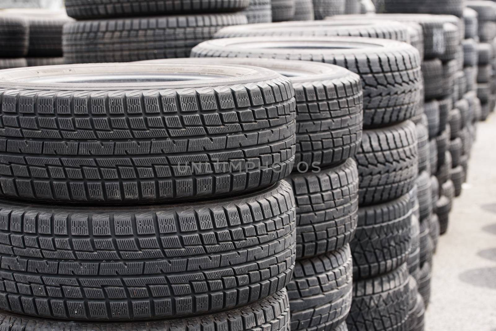 Car tires. Used old car tires at warehouse