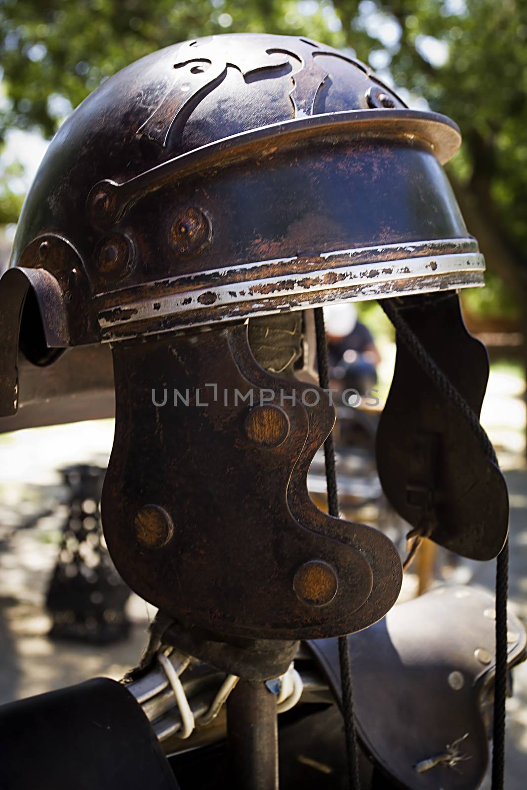 Vintage helmet of a roman warrior outdoors