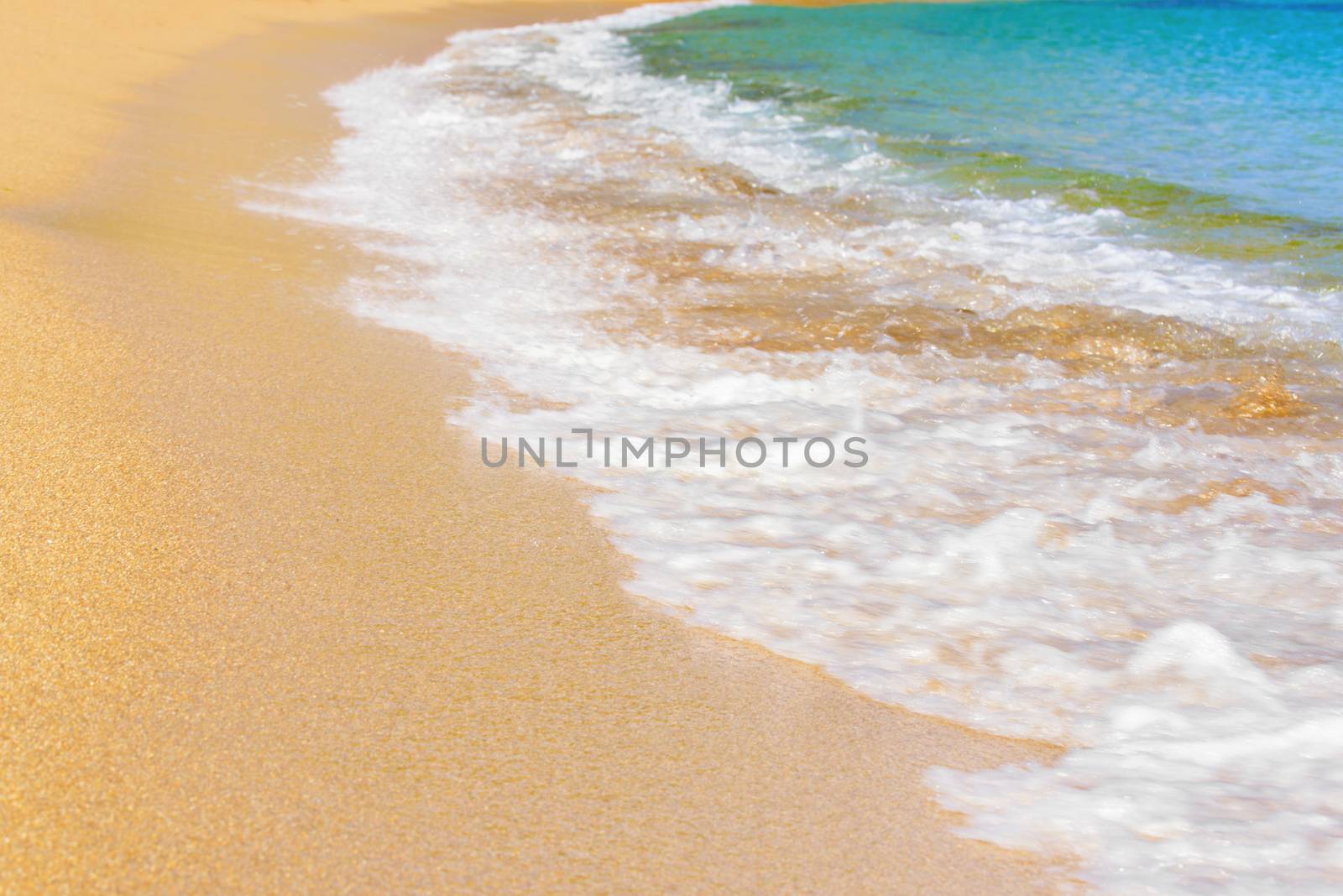 Sea surf on the beach. Sand beach and turquoise sea