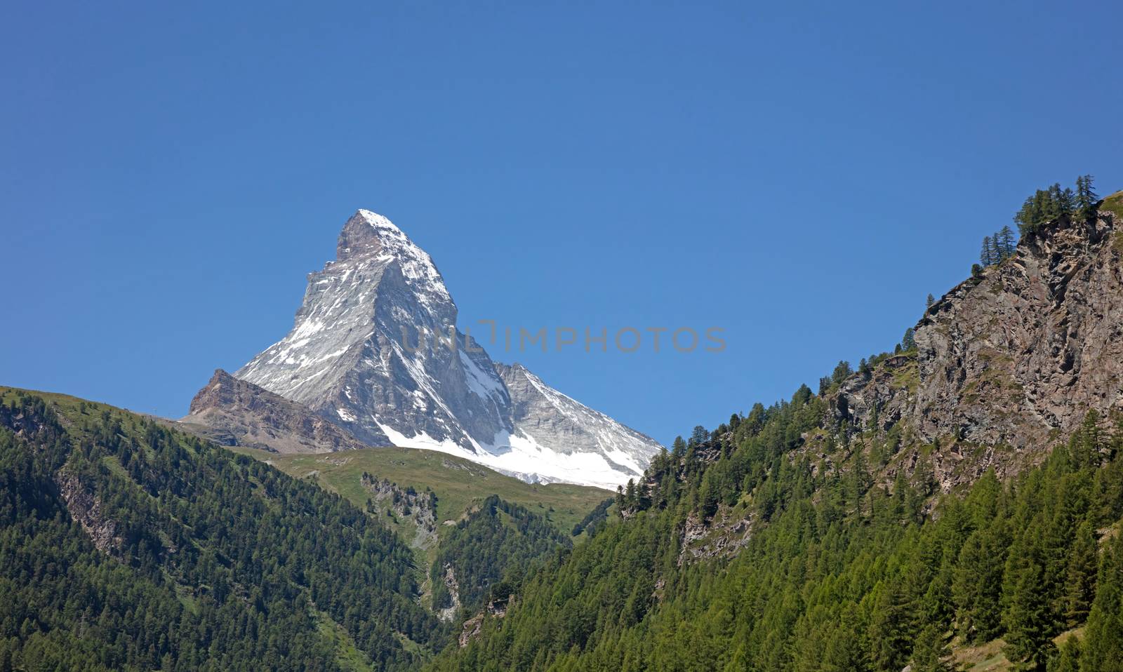 The Matterhorn, the iconic emblem of the Swiss Alps, summertime