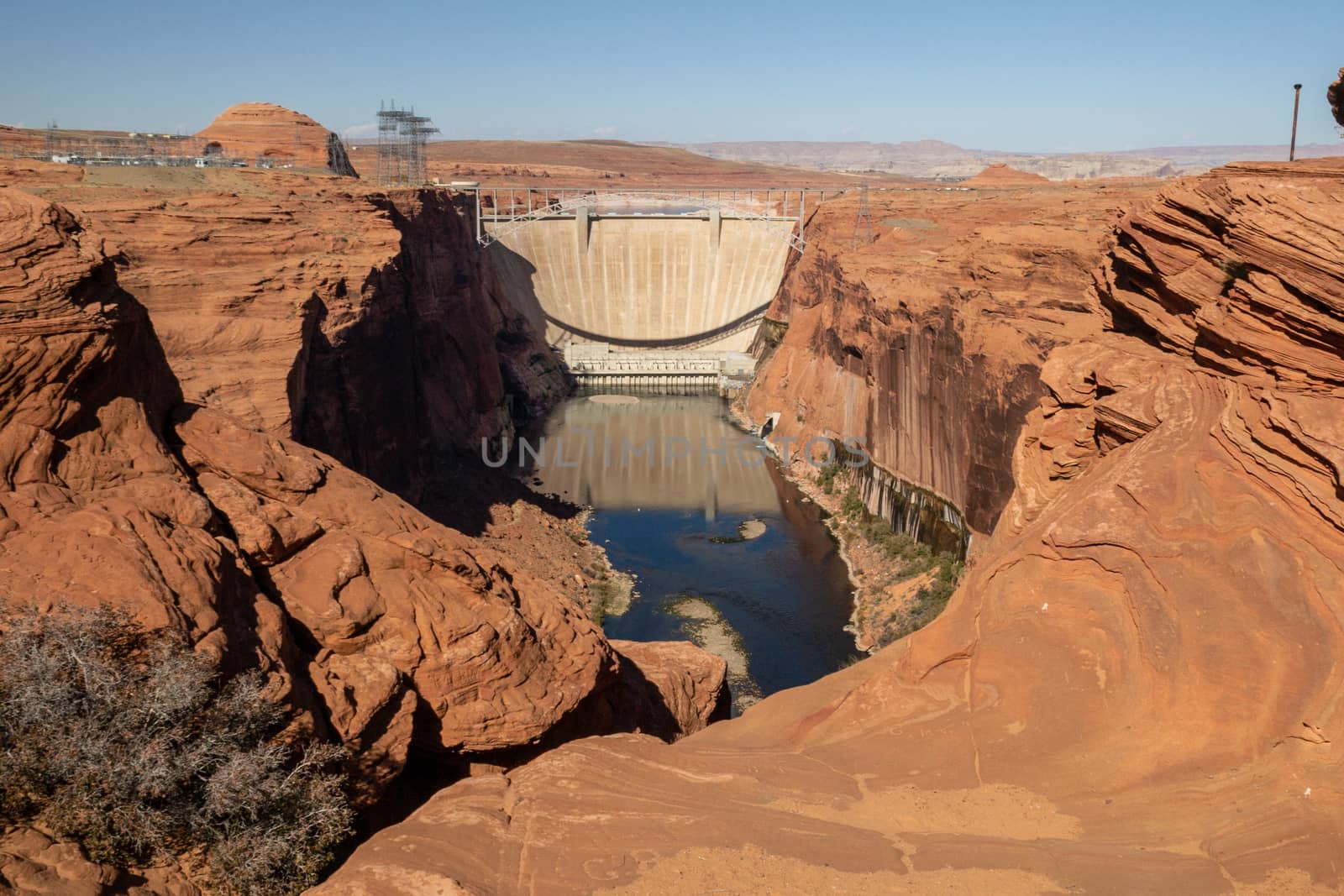 Lake Powell, Page, Arizona November 2013: High angle view of the arch-gravity Glen Canyon dam used for electricity generation on the Colorado River