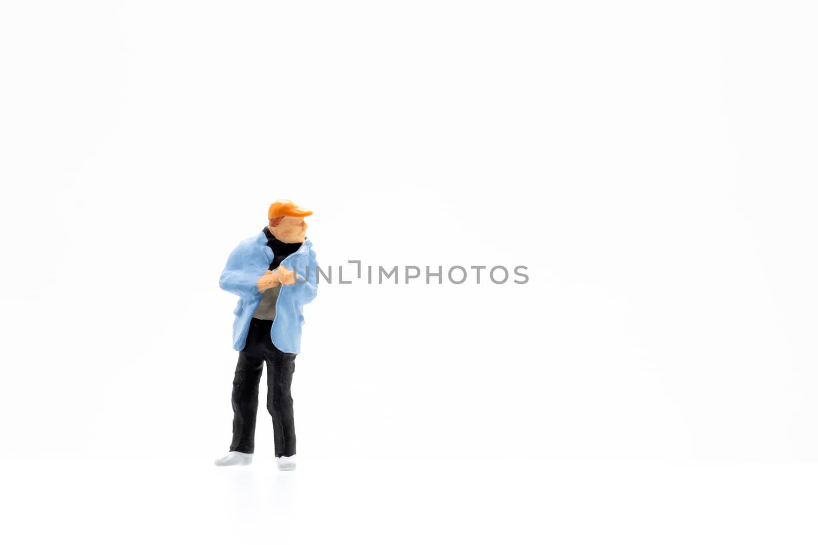 Miniature people standing on white background and space for text