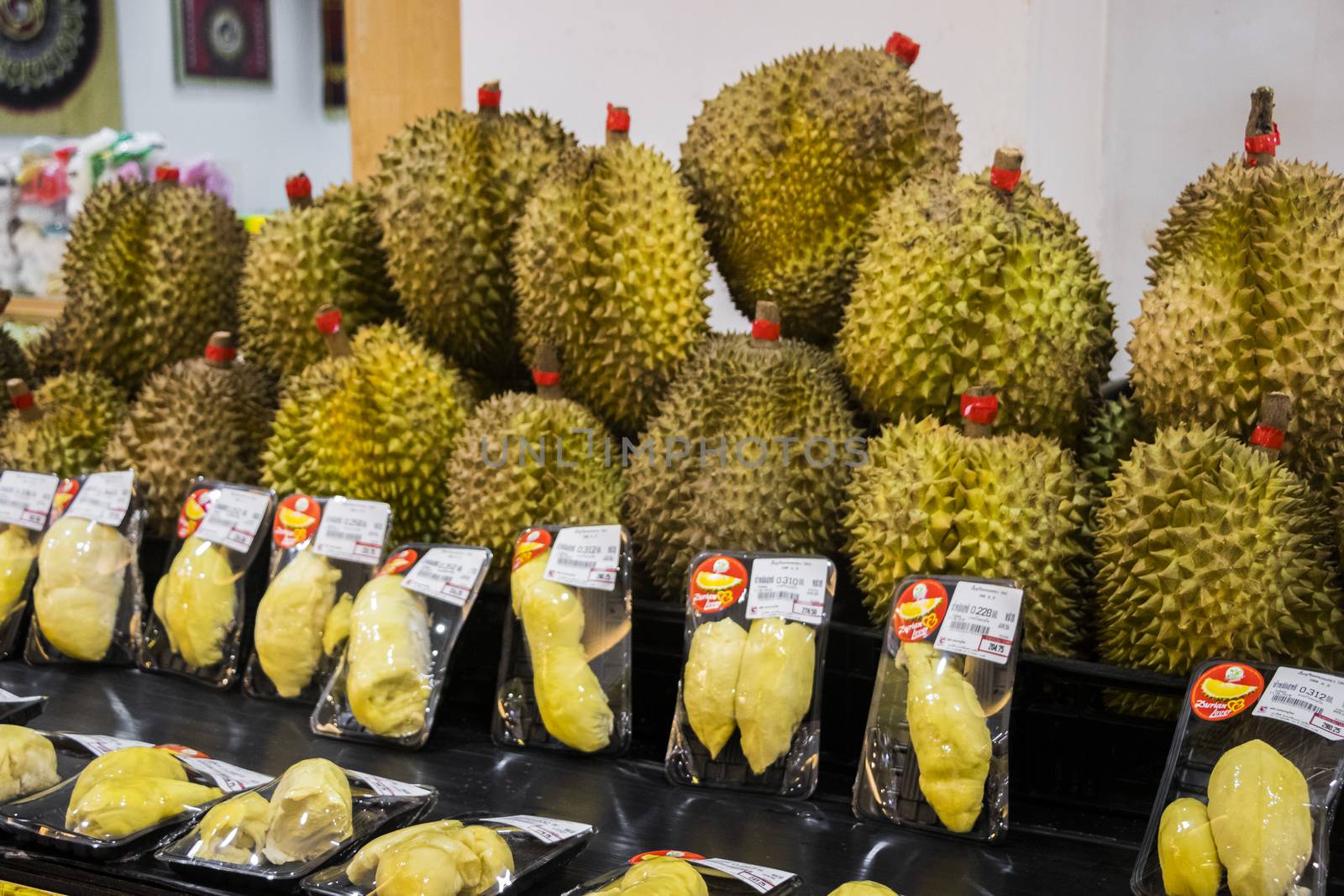 Durain fruit at the market in a supermarket, Phuket, Thailand. by Arkadij