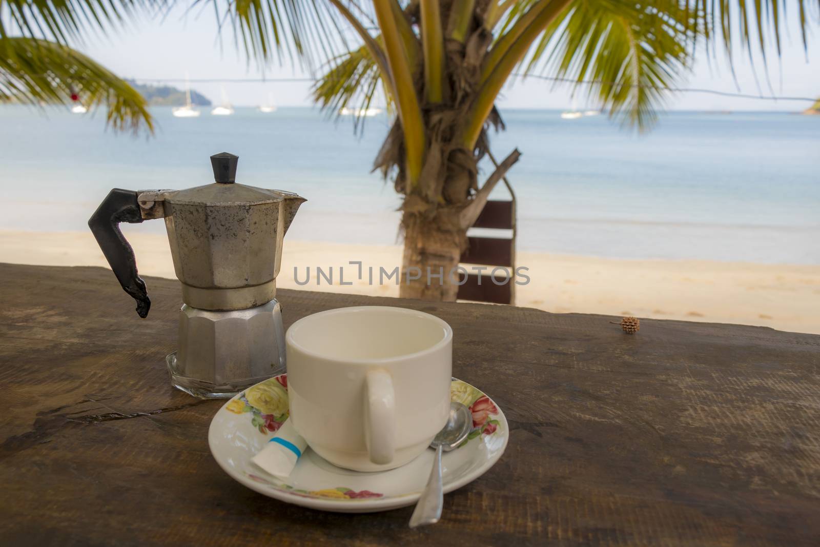 Drinking coffee in paradise Koh Phayam, Ranong, Thailand. by Arkadij