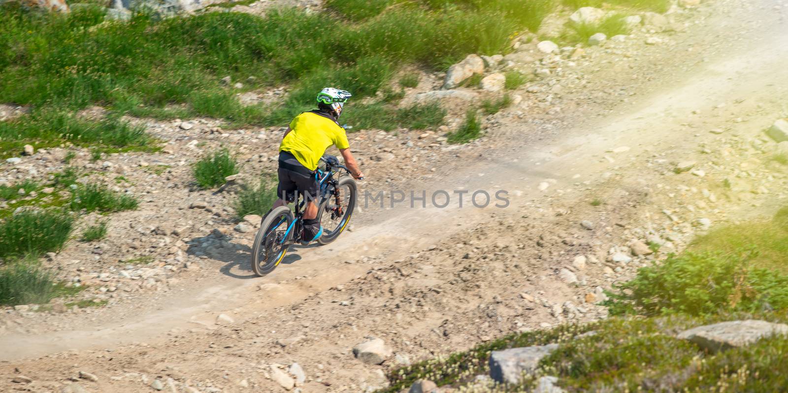 Biking on the Mountain Trail in summer season by jovannig