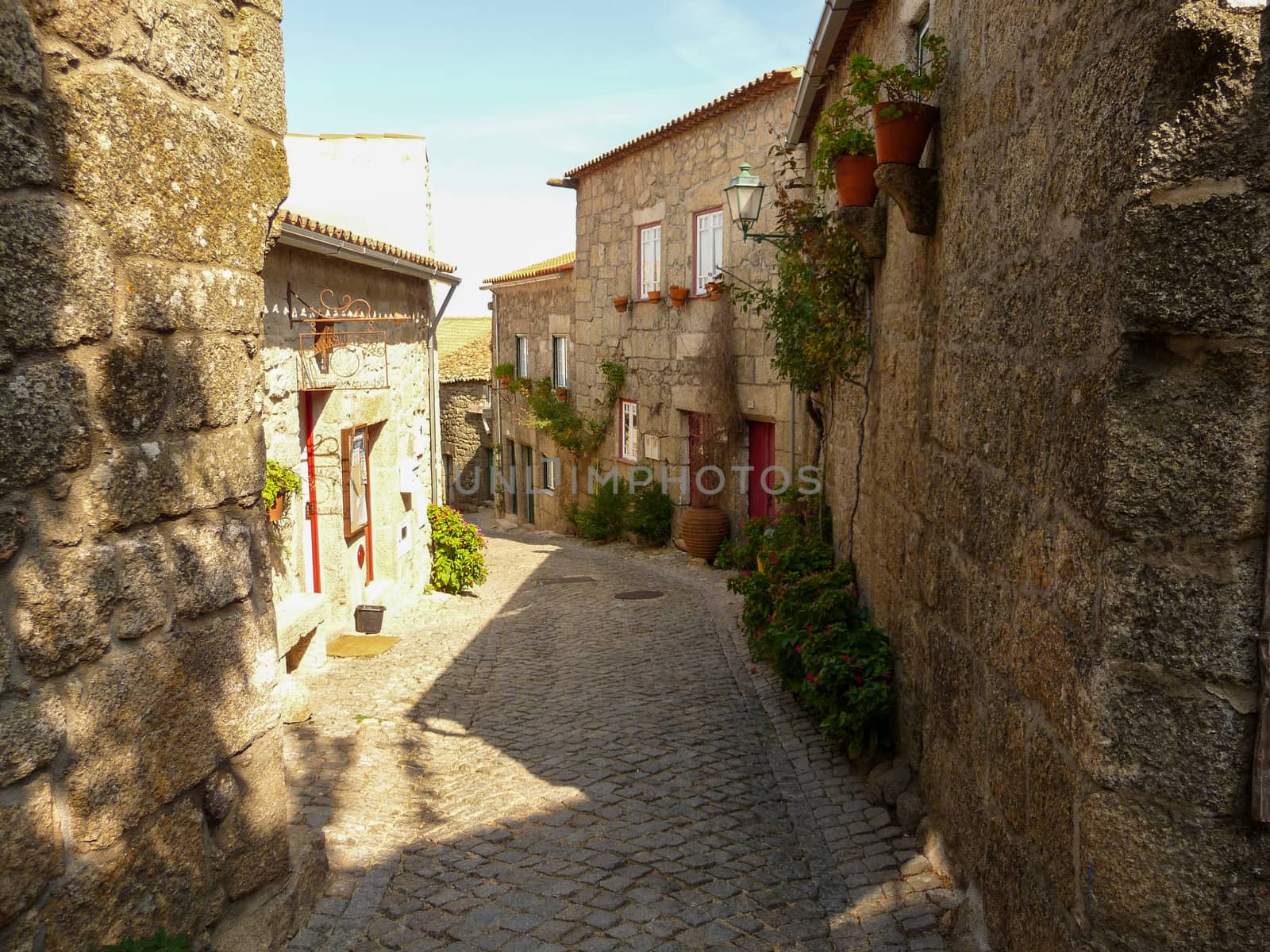 Narrow streets of the village Monsanto in Portugal. by kb79