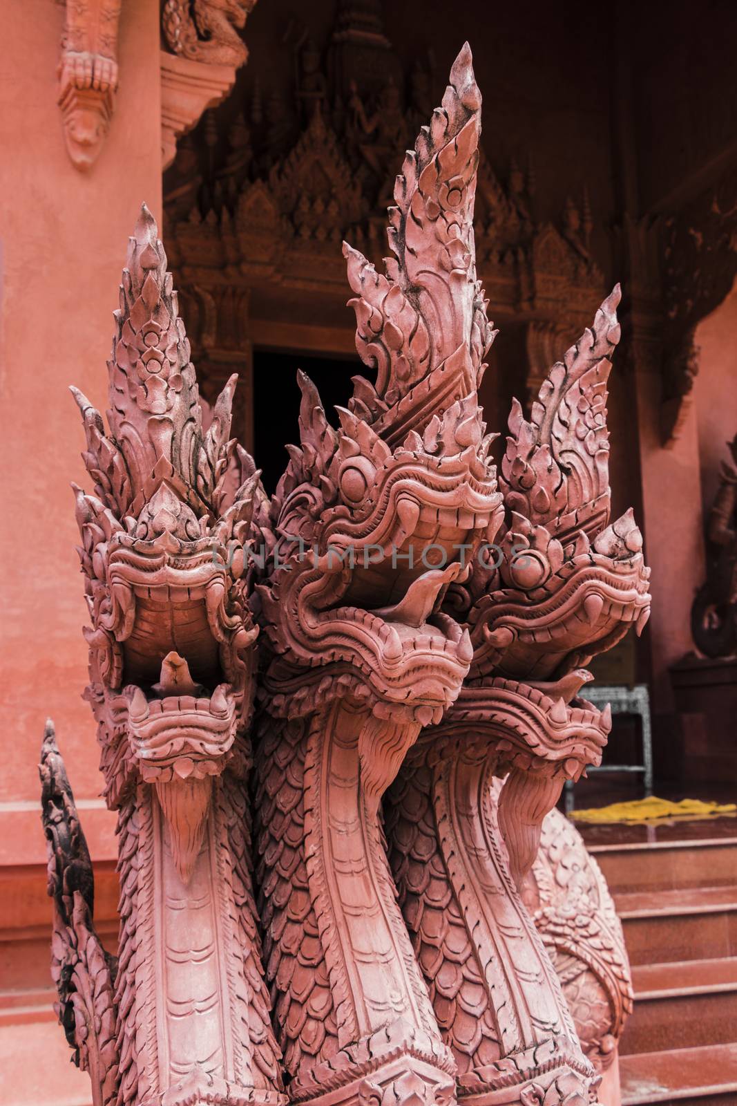 Dragons, scorpionfish, Wat Sila Ngu red temple, Koh Samui Thailand. by Arkadij