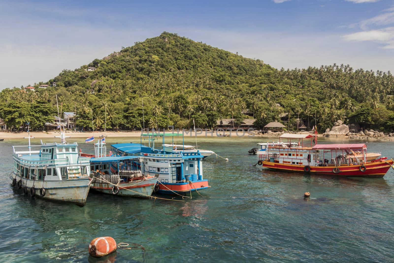 Koh Tao island in Surat Thani, Thailand. Songserm Pier with boats and ships.