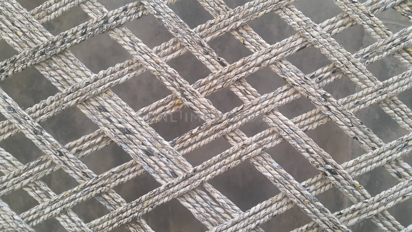 Closeup view of dried jute thread or ropes interwoven for making traditional old style bed called charpai