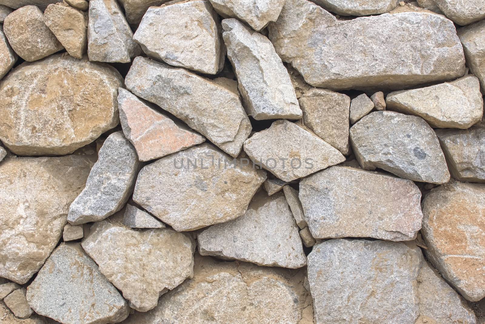 Wall of stones. Texture of a stone wall.