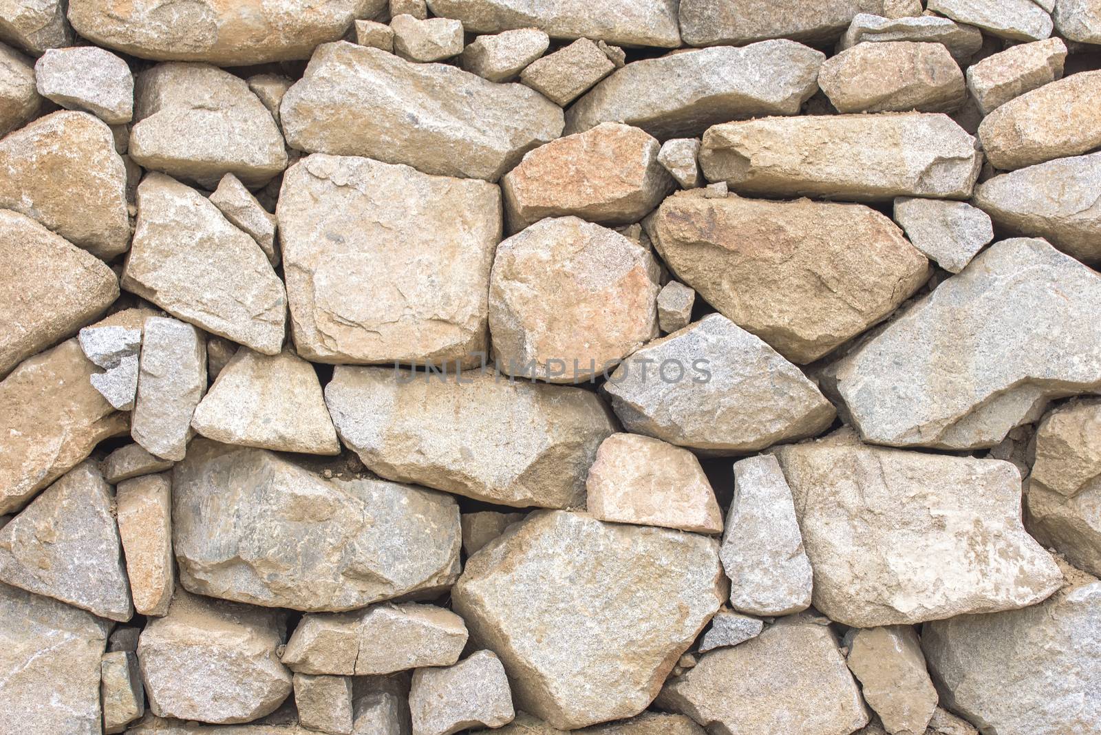 Wall of stones. Texture of a stone wall.