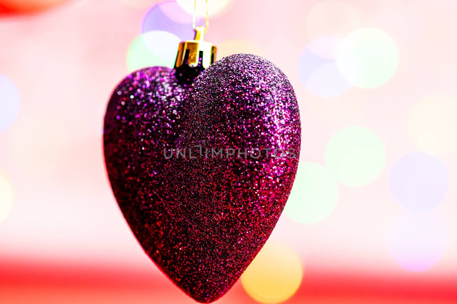 Heart shaped Christmas decoration isolated on blurred background by vladispas