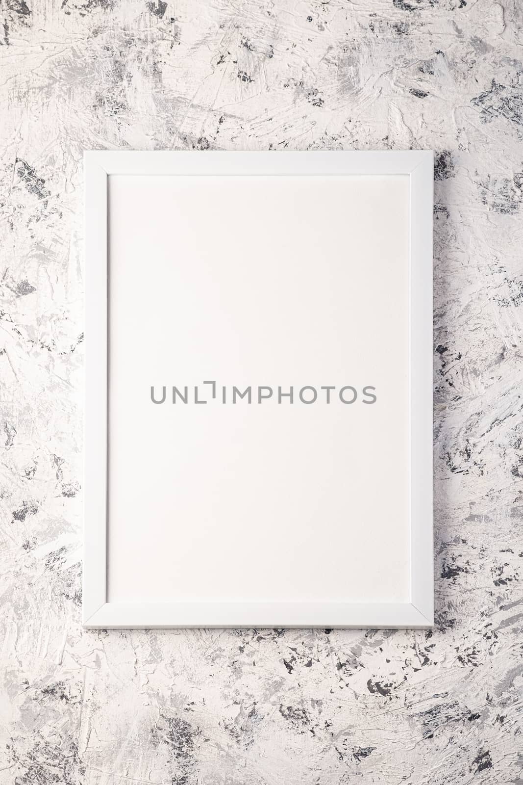 White empty template picture frame on textured bright, grey and black background, top view, mockup copy space