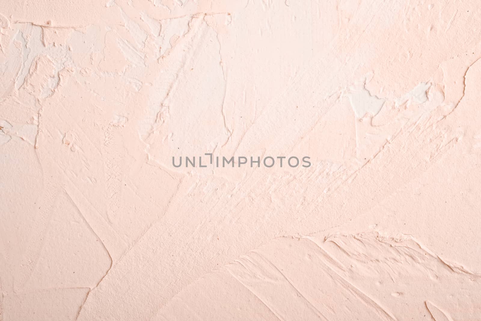 Photo of creative bright textured background in cream peach and white grunge colors, backdrop