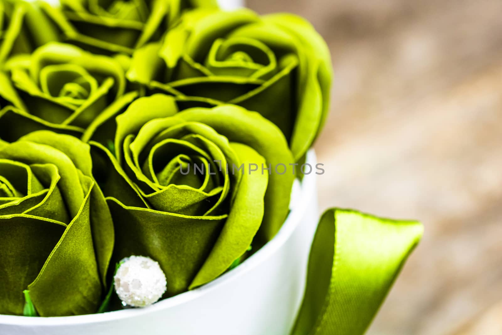 Green roses in a round luxury present box. Bouquet of flowers in by vladispas