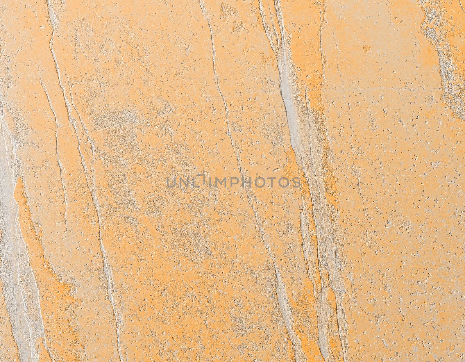 Grungy stone texture background. Abstract yellow background.