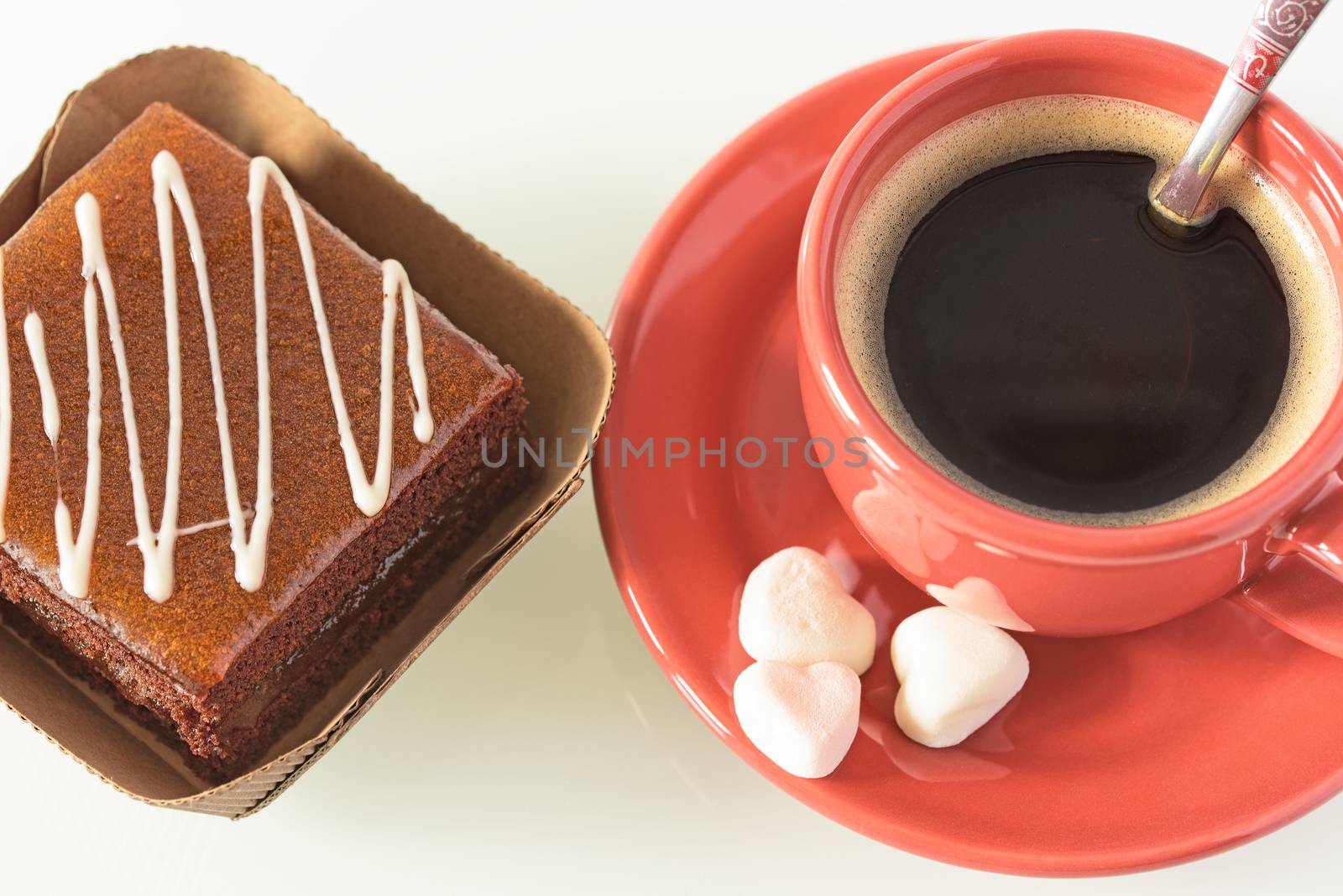 Cake and cup of coffee on the table. Cake sweet dessert.