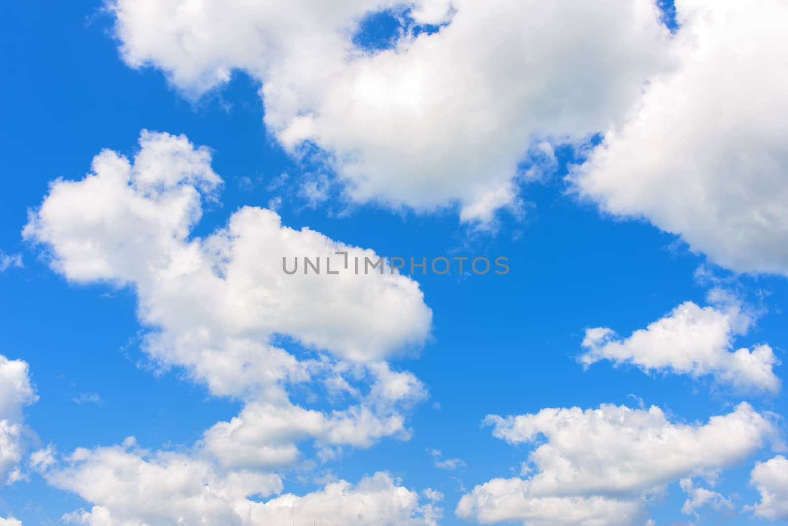 Clouds blue sky. Blue daytime sky, bright white clouds, sunny weather.