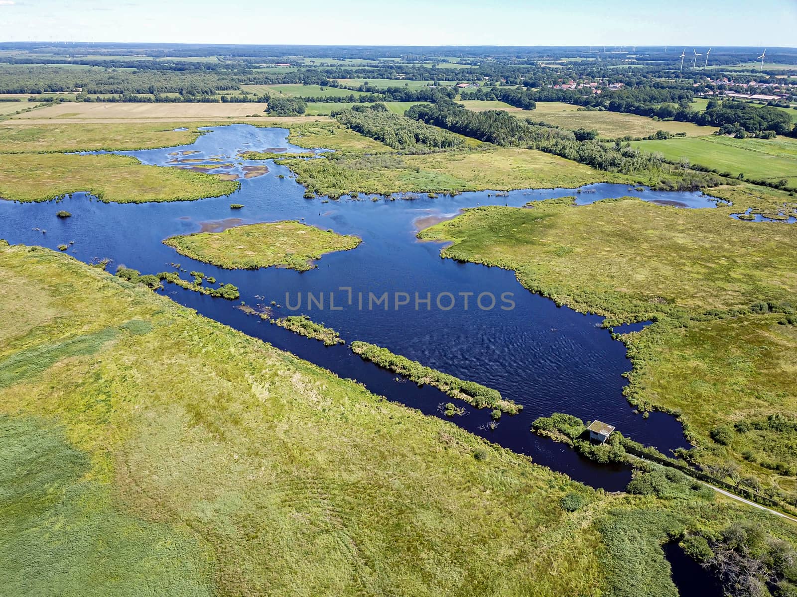 Sellstedter See lake and Ochsentriftmoor taken from above with a drone in Lower Saxony, Germany.