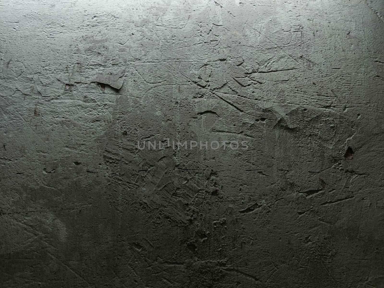 obsolete dusty green painted plaster wall texture and background.