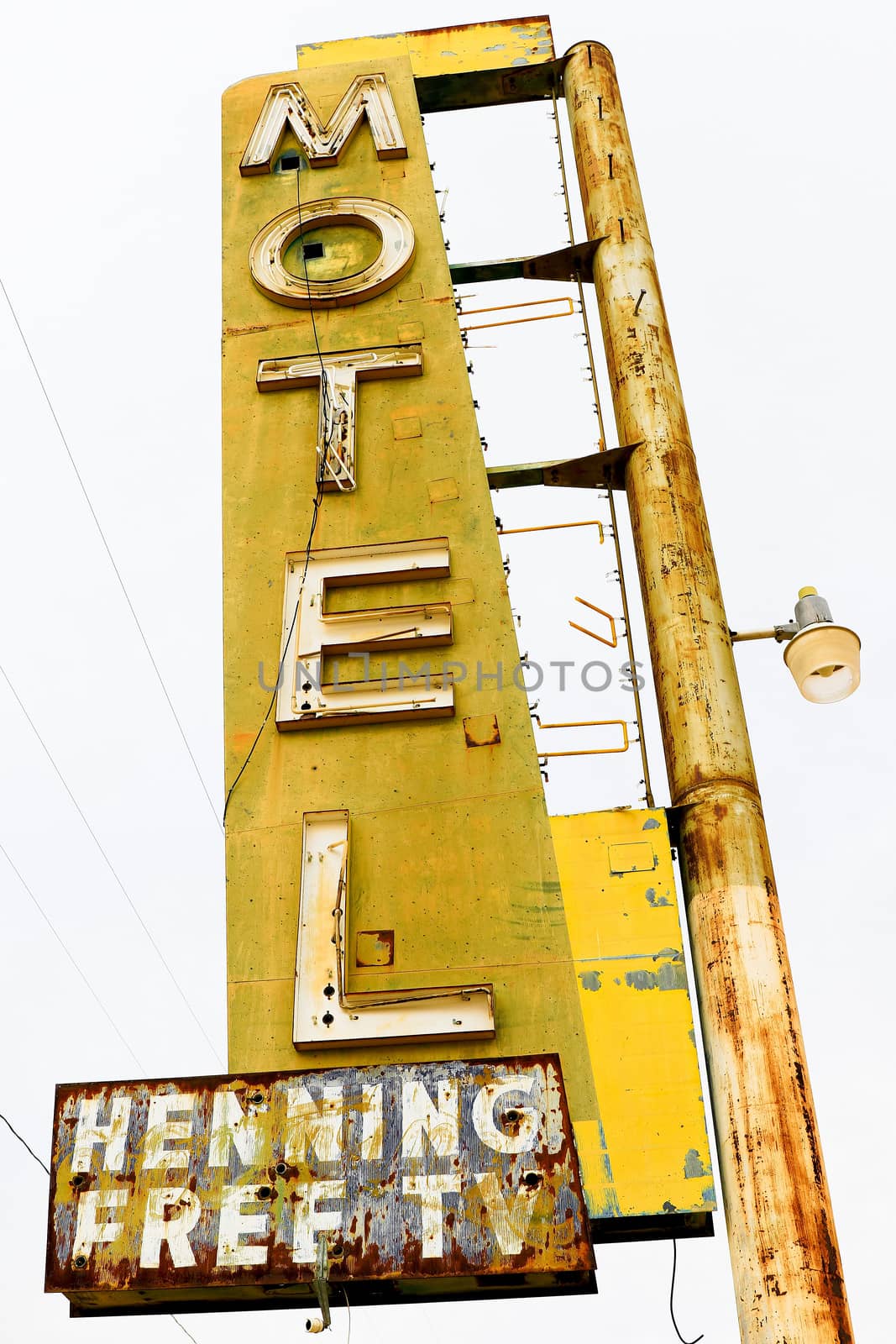 Old Motel sign ruin along historic Route 66 in the middle of California vast Mojave desert. by USA-TARO