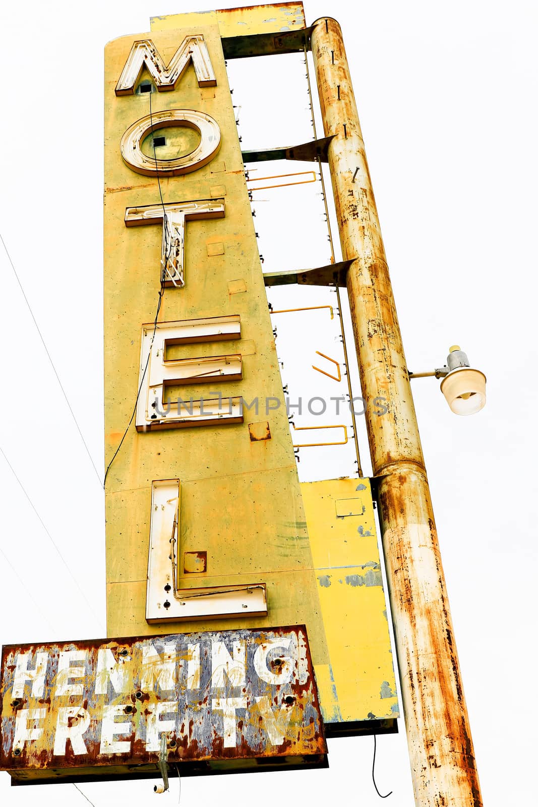 Old Motel sign ruin along historic Route 66 in the middle of California vast Mojave desert. by USA-TARO