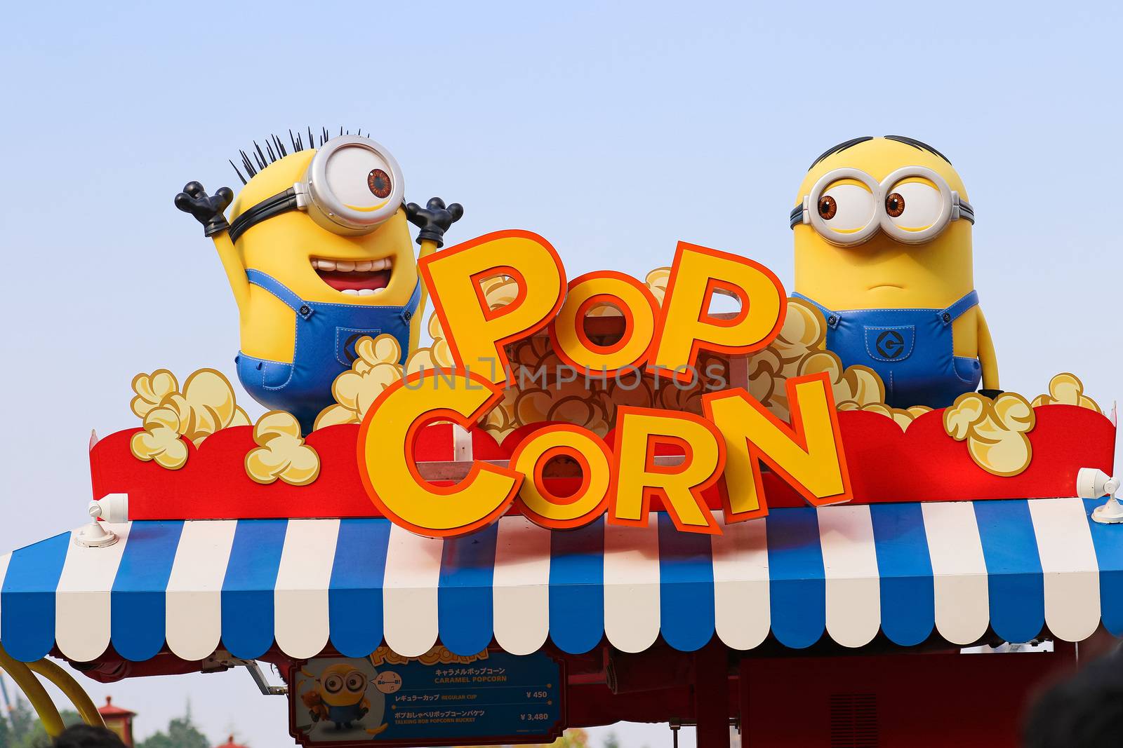 OSAKA, JAPAN - APR 21, 2017 : Photo of "HAPPY MINION POP CORN SHOP", selling Minion Pop Corn, located in Universal Studios, Osaka, Japan. Minions are famous character from Despicable Me animation.