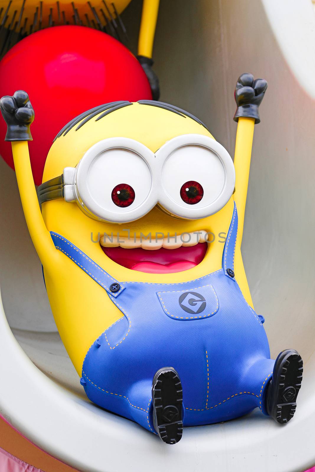 OSAKA, JAPAN - June 24, 2017 : Statue of "HAPPY MINION", located in Universal Studios Japan, Osaka, Japan. Minions are famous character from Despicable Me animation_A