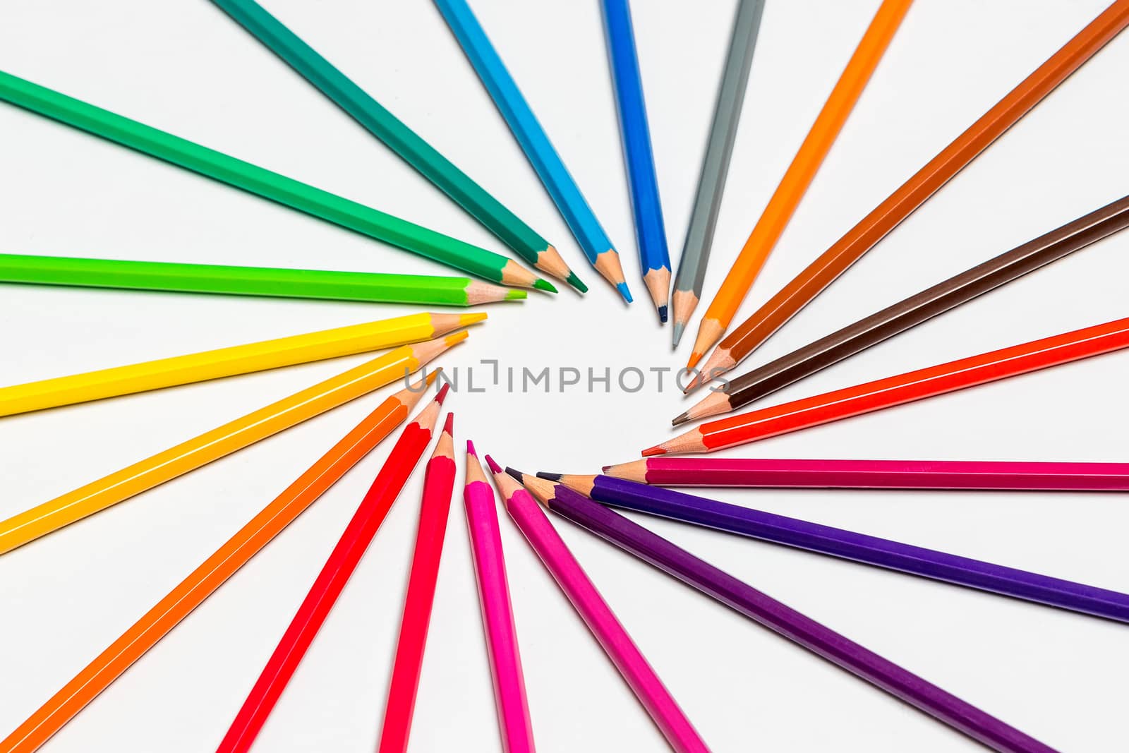 Close up of color pencils on white background. Back to school concept