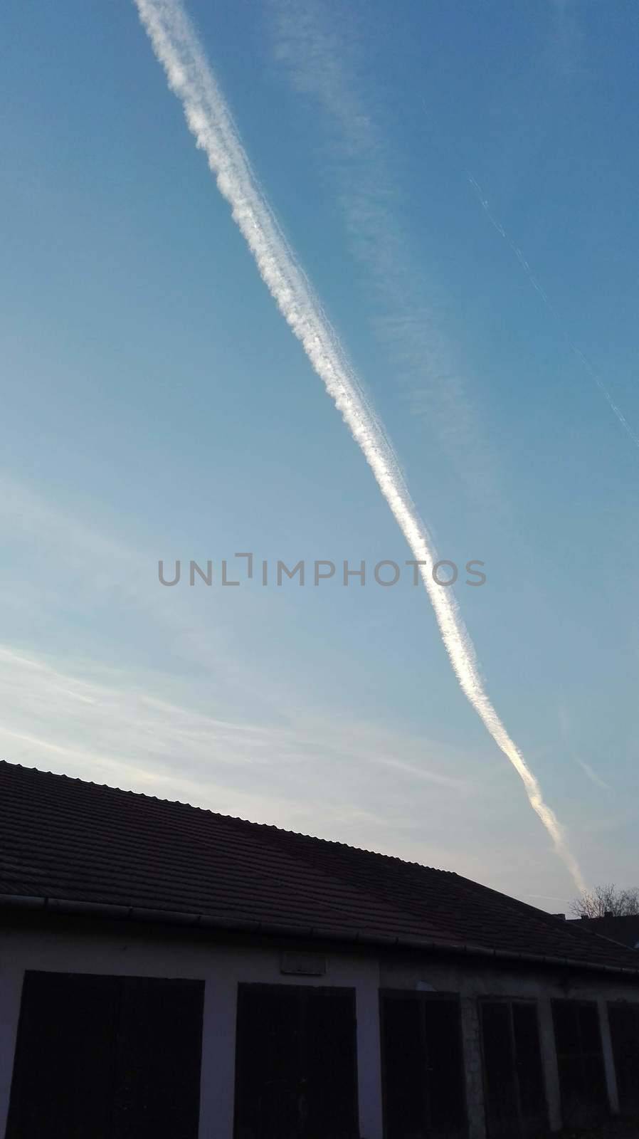 Condensate strip streave scan in front of garage rows in Szeged. High quality photo