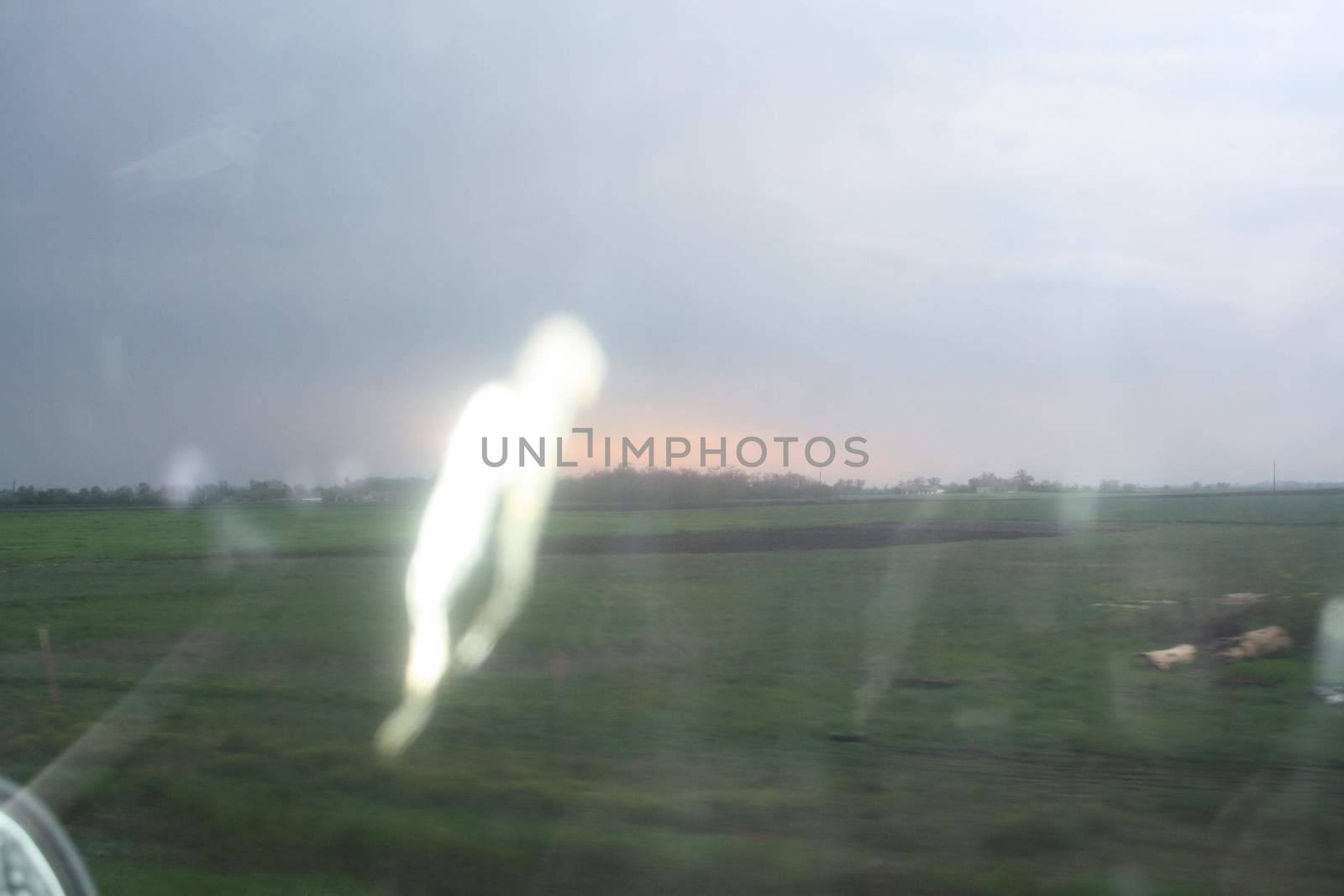 Light phenomenon in the car window on the way home. High quality photo