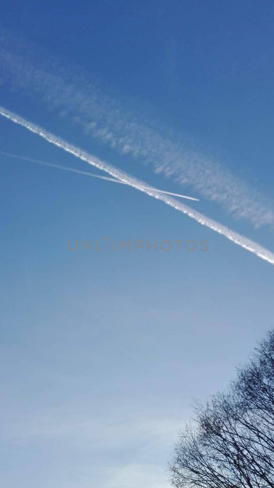 Condensate strips in Újszeged in the afternoon. High quality photo